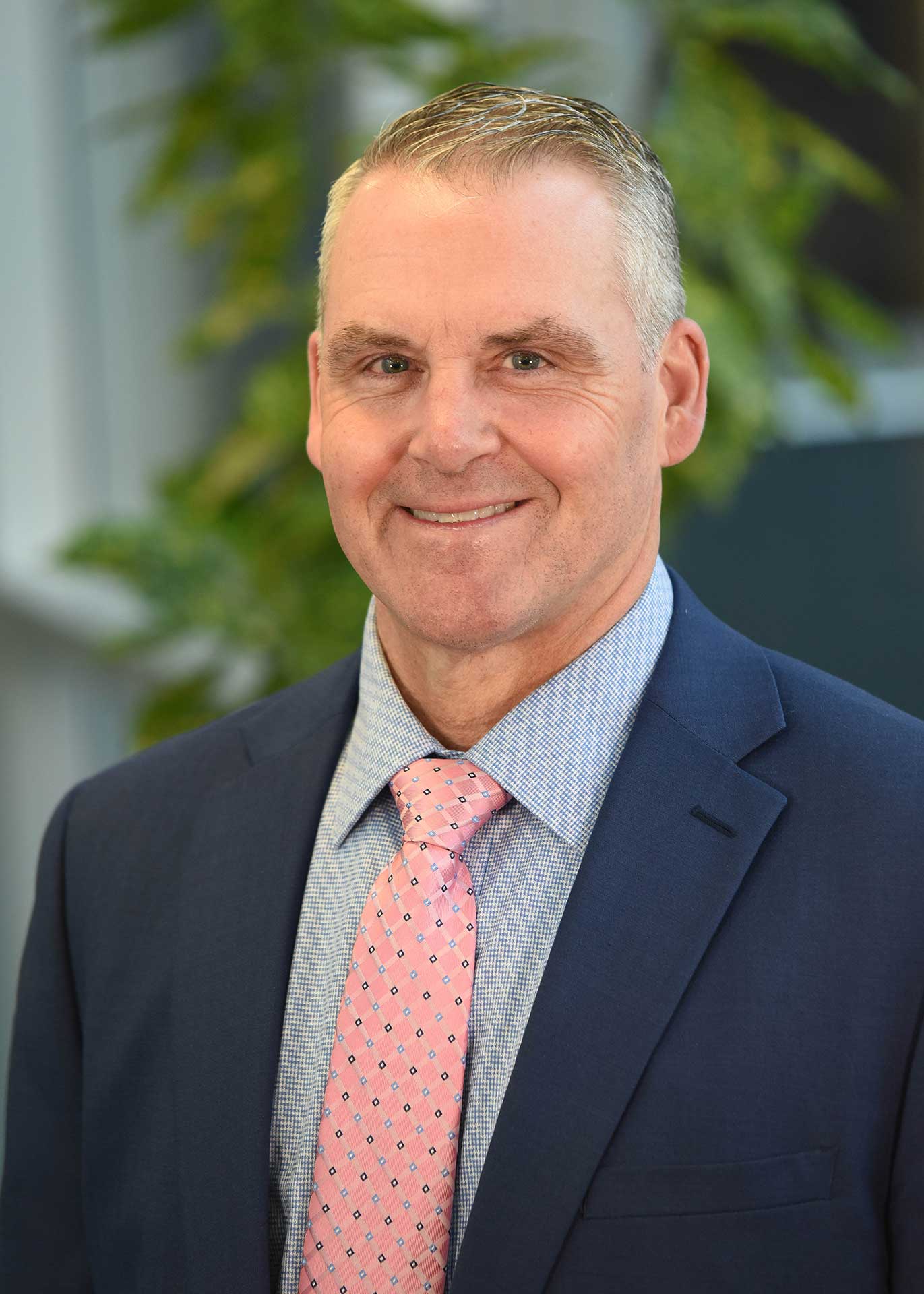 Stan Auman, Refrigerated Operations & Training Program Manager at Prime wearing a blue suit jacket.